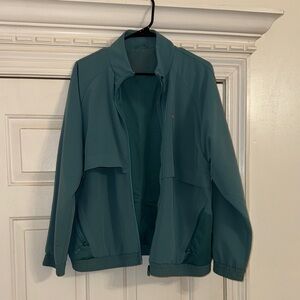 Figs Teal Jacket *matching jacket for teal scrub set in profile*